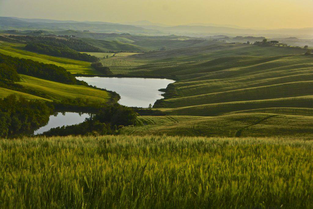 Antonio Cinotti: Sunset on two lakes between Leonina and Vescona, Crete Senesi, Asciano, Tuscany, Italy.