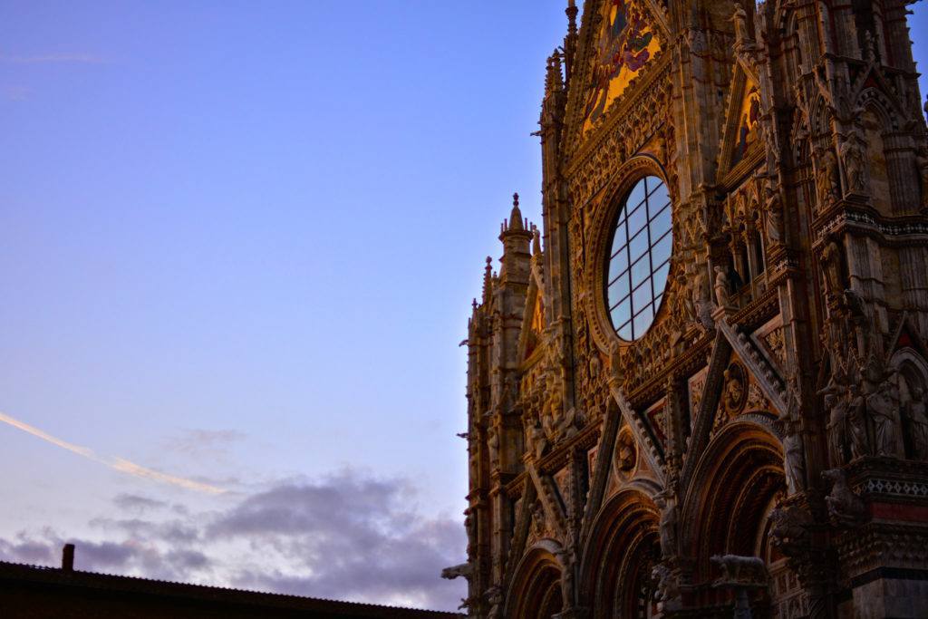 The cathedral facade at sunset | Siena Photos The cathedral facade at sunset | Siena Photos